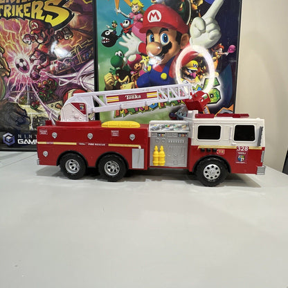 2009 TONKA FIRETRUCK 328 HSABRO WITH WORKING LIGHTS AND SOUNDS ROTATING LADDER