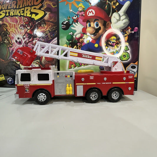 2009 TONKA FIRETRUCK 328 HSABRO WITH WORKING LIGHTS AND SOUNDS ROTATING LADDER