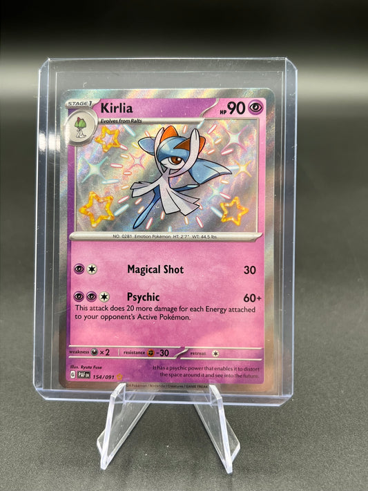 Kirlia - 154/091 - SV: Paldean Fates (PAF) SV: Paldean Fates Pokémon TCG